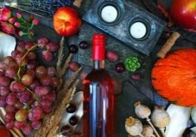 Food and wine bottle laid out on a surface